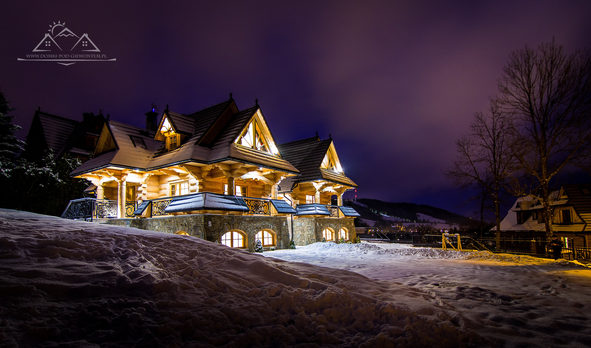 domek do wynajęcia zakopane - Domki pod Giewontem w nocnej scenerii
