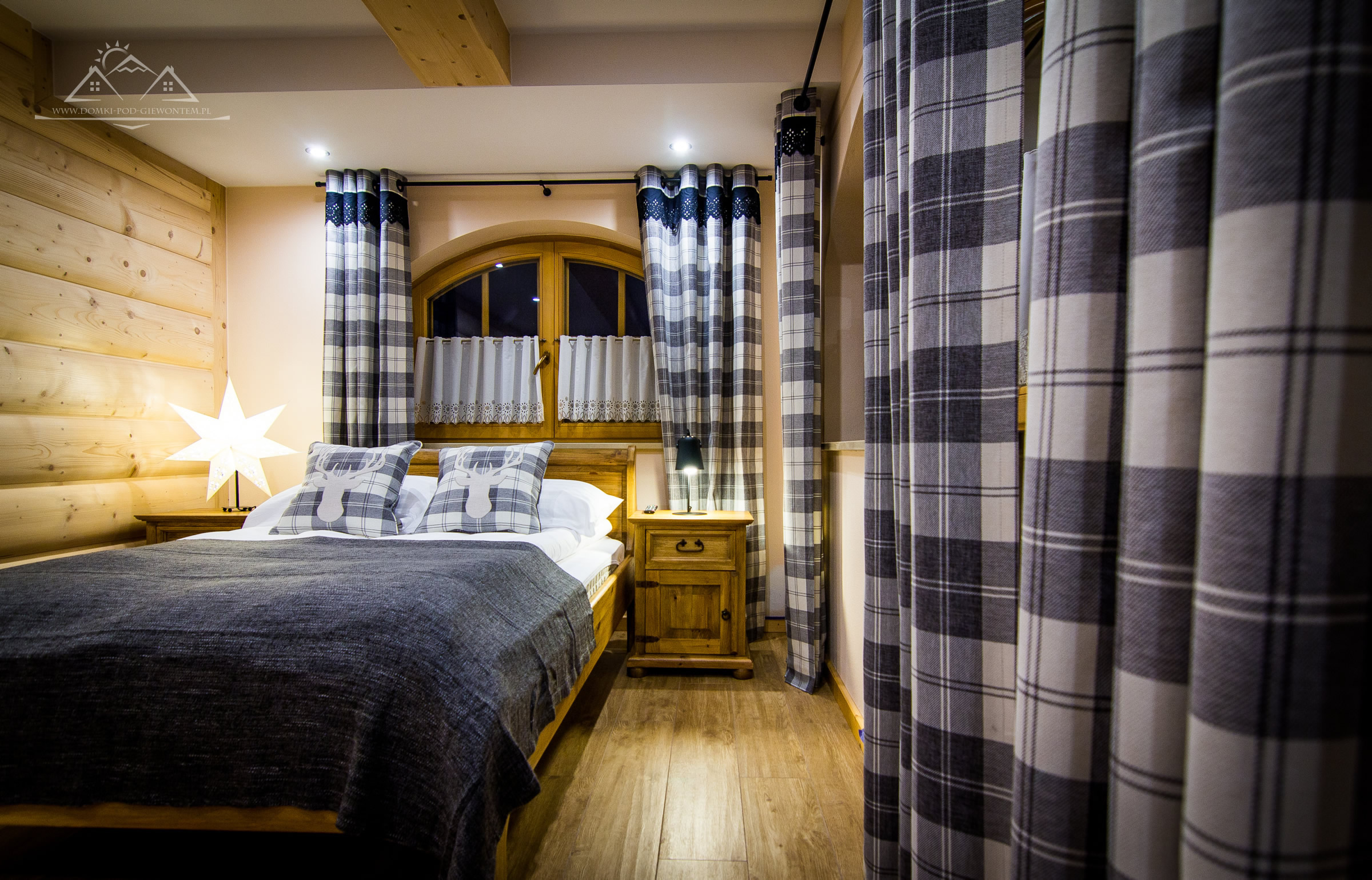 apartament do wynajęcia zakopane - Sypialnia utrzymana w ciepłych barwach
